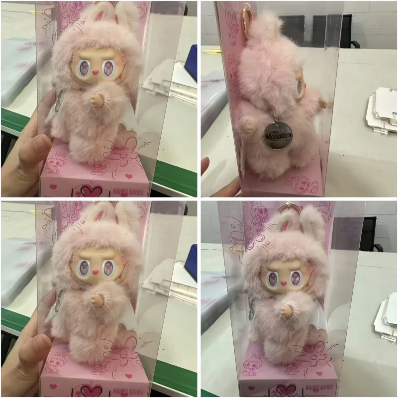 

Новый продукт The Monster Labubu Pink Dolls Розовая белая кукла с крылом Творческая смена подвески Модель Реплика Высокое качество Рождественский подарок