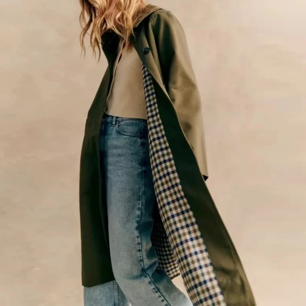 TWOTWINSTYLEll Solid Spliced Button Minimalist Long Coat For Women Lapel Long Sleeve Loose Casual Coat Female Fashion Style New