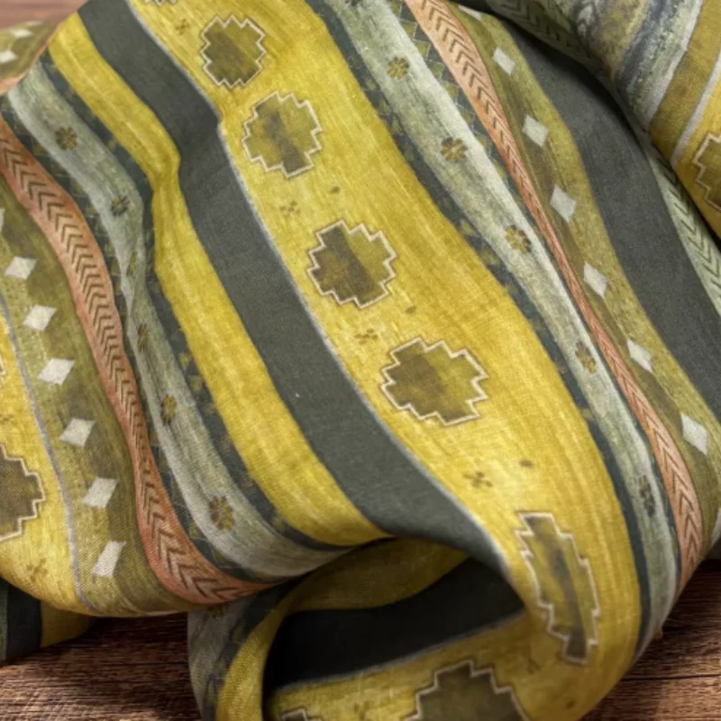 

Yellow printed ramie fabric, used for handmade shirts, dresses, and other clothing.