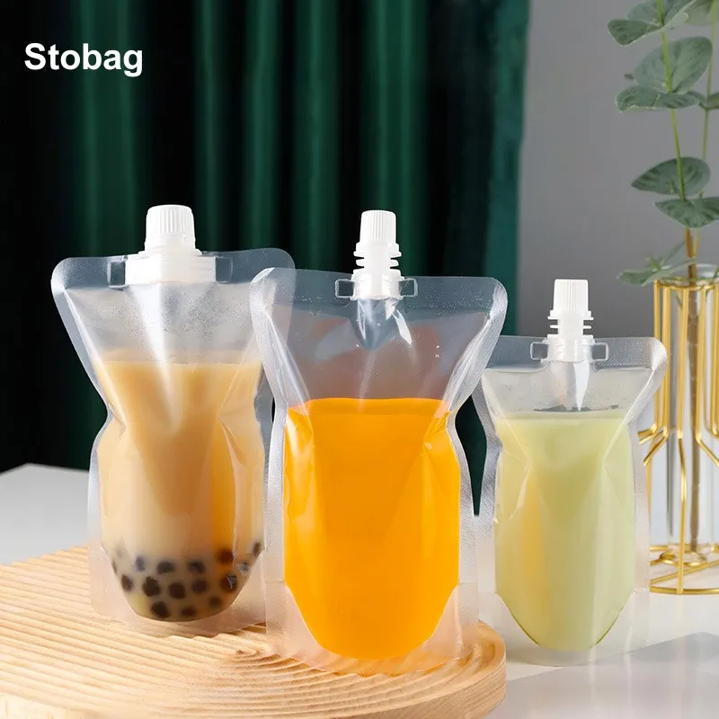 StoBag 100pcs Wholesale Transparent Liquid Packaging Drinking Nozzle Bags Clear Juice Beverage Sealed Storage Reusable Pouch