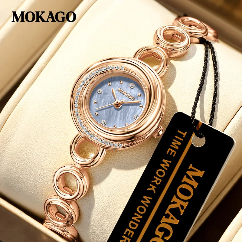 Orologio da donna al quarzo di lusso impermeabile quadrante in madreperla braccialetto stella diamante cinturino in rame orologio da polso elegante e versatile