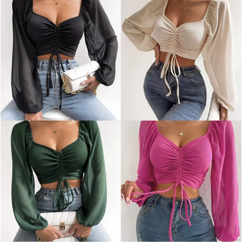 

Европейская и американская женская одежда 2025 года. Тонкий топ с глубоким вырезом и v-образным вырезом, сращенными шнурками и рукавами-фонариками.