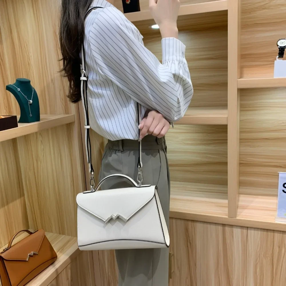 

2025 New Niche Design Light Luxury Simple Women's Handbag, Single Shoulder Diagonal Cross Shaped Mini Square Bag