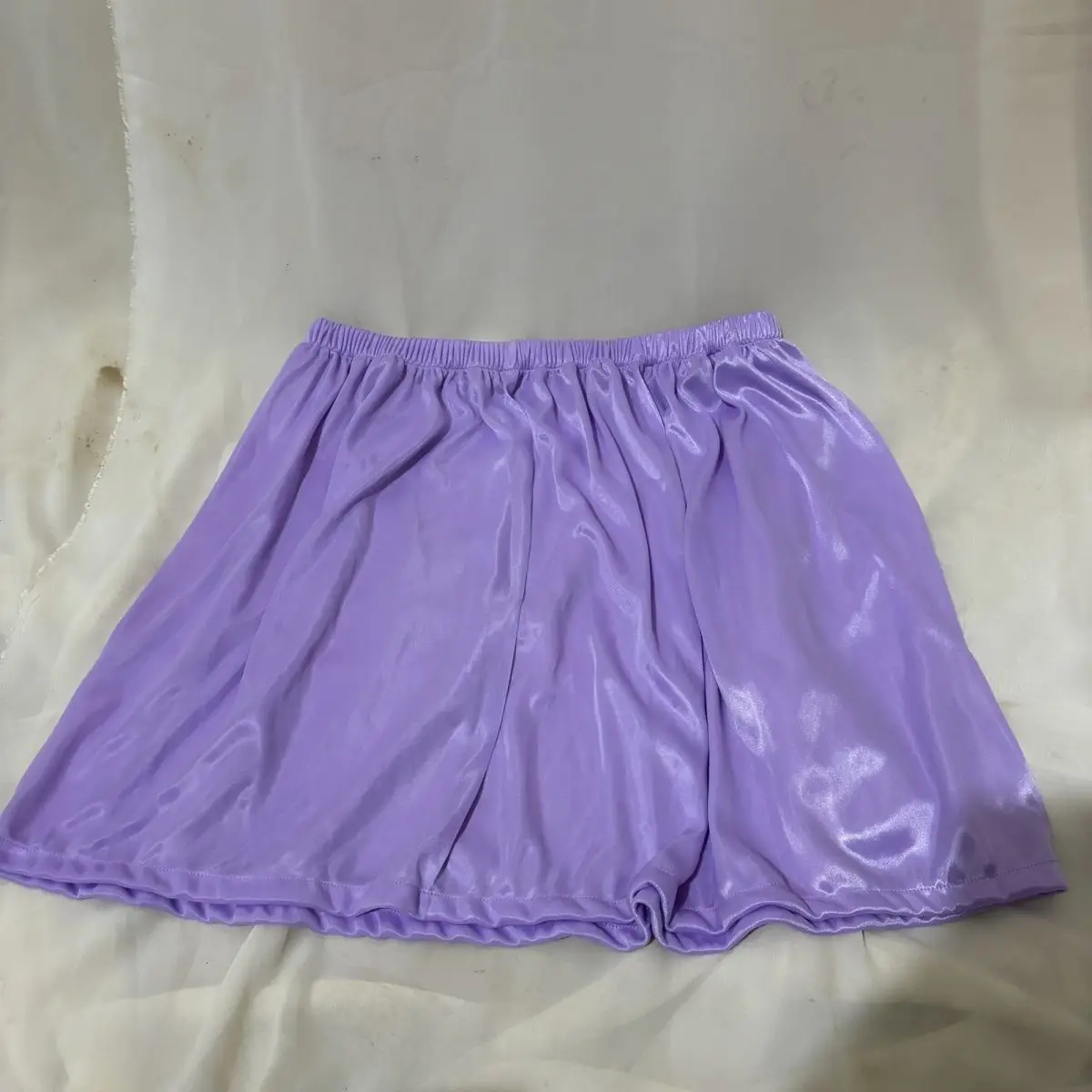 Length 45cm summer glossy transparent satin sexy skirt Women a line thin seamless short loose bottoms