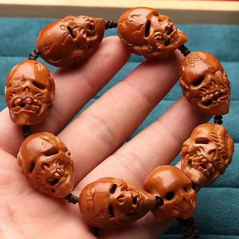 

Crafts Natural Large Seeds Old Materials Olive Nut Hollow-out Carving Personality Five Poison Skull Ghost Bracelet Plate for Men