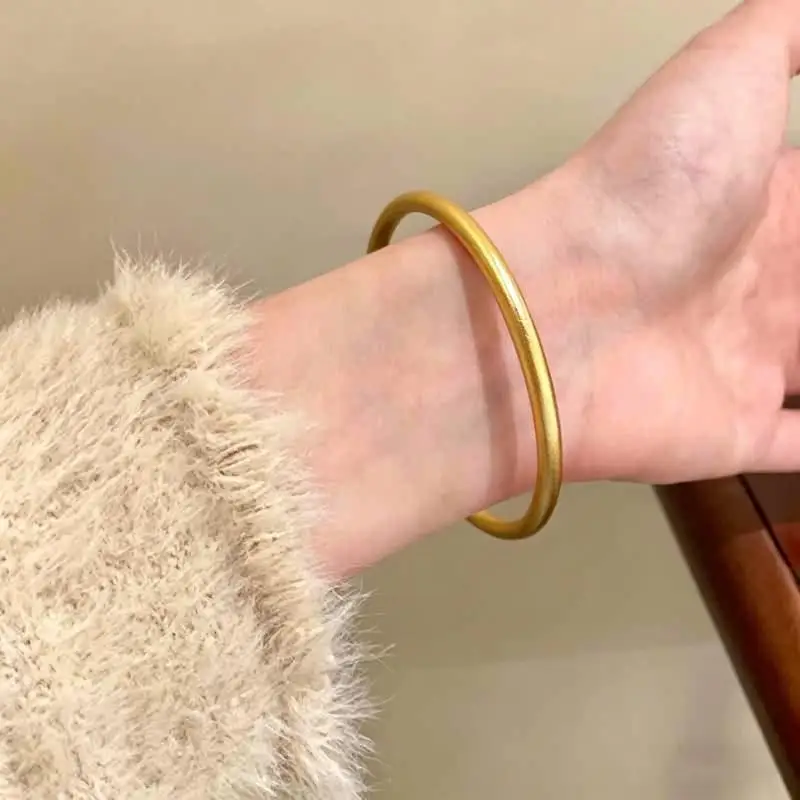 Fashionable Gold Bracelet for Women with Round Design Perfect for Office and Evening Wear