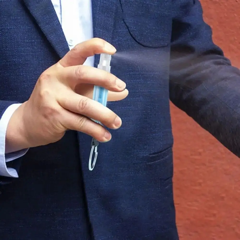 クリエイティブな新型プレス式エレベーターボトルペン型キーホルダー付きスプレーボトル携帯用3MLスプレーボトル男女兼用