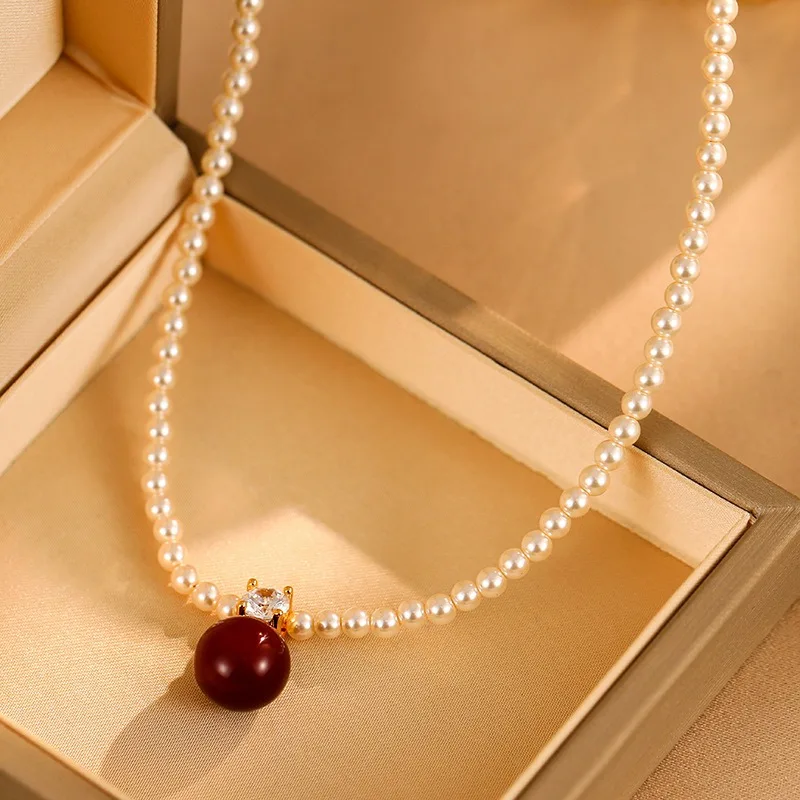 

Французское ретро-колье с красным жемчугом, цепочка на ключицы, легкая роскошь, высококачественное ожерелье, уникальный дизайн, модный темпераментный кулон