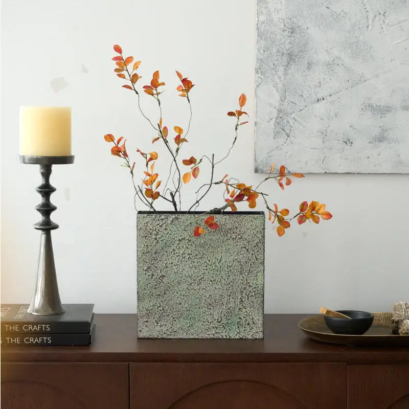 Indian craftsmanship is simple, medieval mottled, rusted, square green vase, decorative ornament with dried flowers