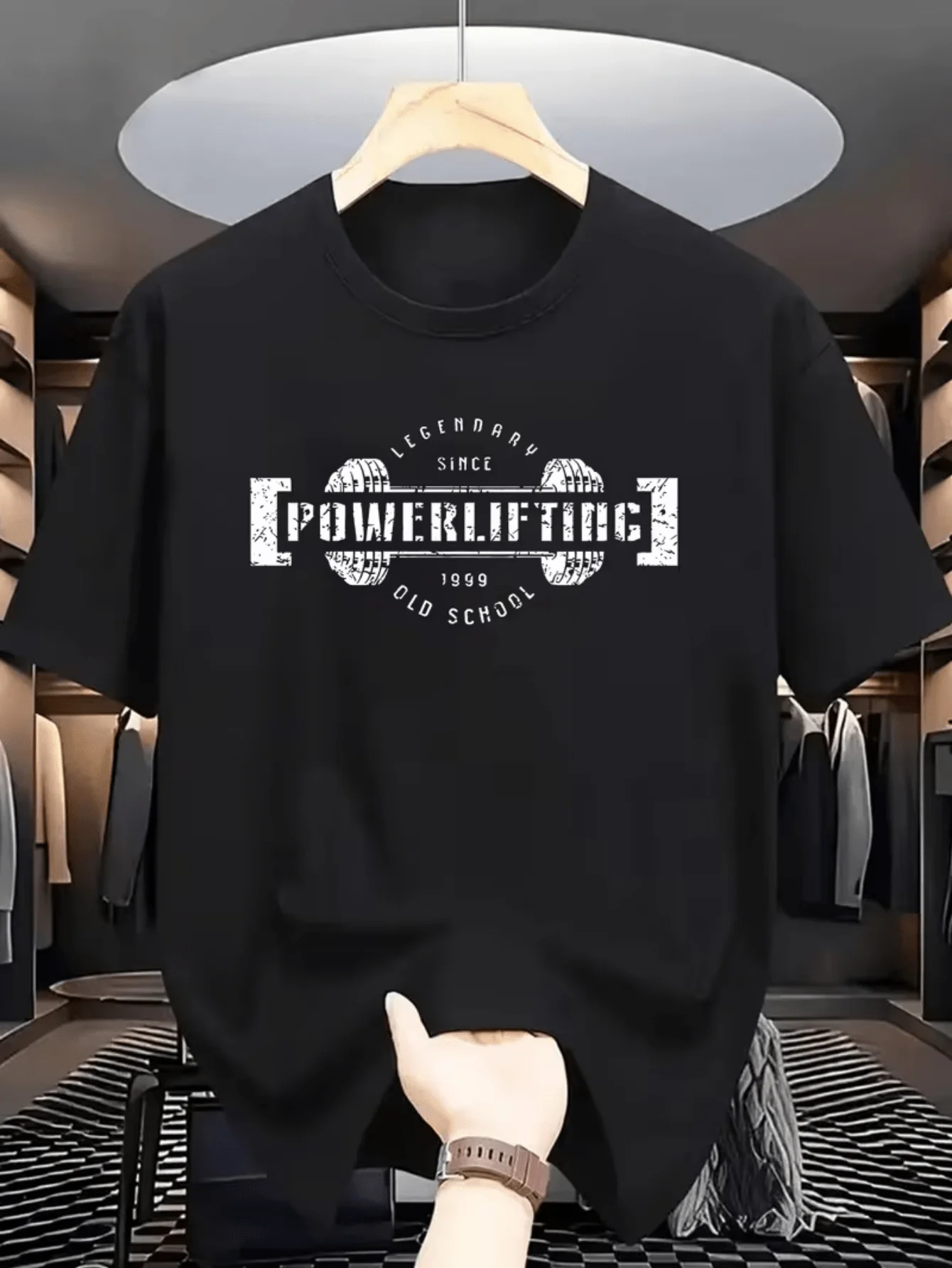 Powerlifting-themed graphicT-shirt featuring a retro athletic style suitable for powerlifting competitions and training sessions