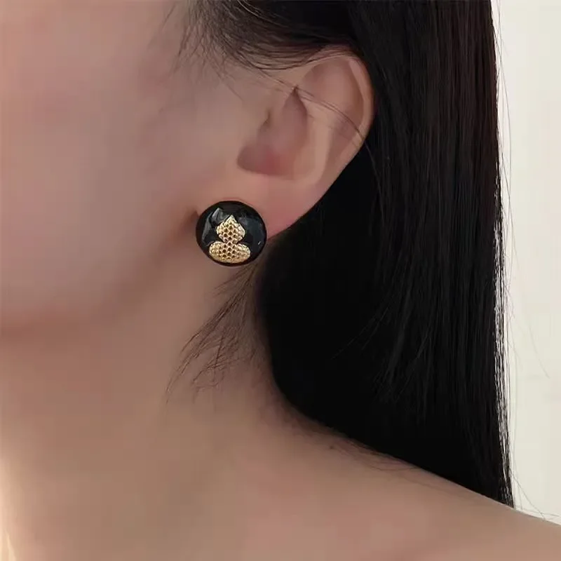 Retro black gold enamel gourd stud earrings New Chinese simple versatile stud earrings Femininity advanced unicorn gourd stud