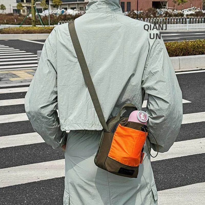 愛らしいカラーブロックウォーターカップバッグ大容量多層軽量トラベルママバッグシングルショルダークロスボディバケットハンドヘルドバッグ