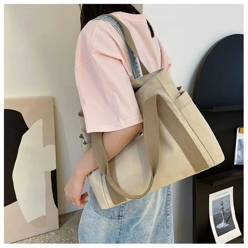 

Female Fashion Solid Color Canvas Tote Bag Simple Light Weight Handbag Portable Multifunctional Multi Pocket Shoulder Bag