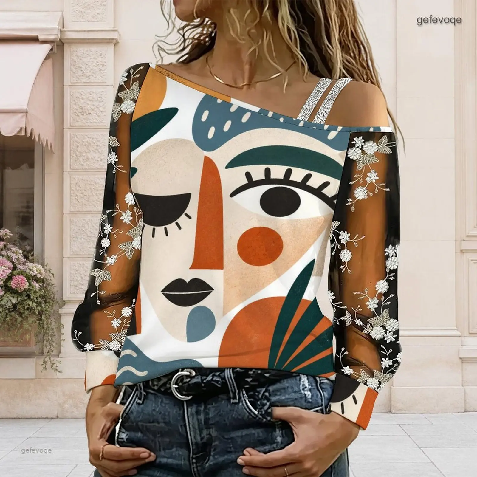 Women Abstract Face Printed Asymmetric Cold Shoulder Long Embroidered Sheer Sleeve Top