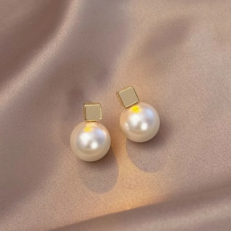 pendientes-de-perlas-blancas-naturales-del-mar-del-sur-aaaa-grandes-simplificados-de-9-10-mm-plata-925