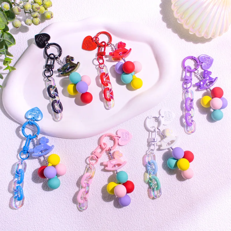 8pcs/set Creative Carousel Spring Key Ring Cartoon Acrylic Chain Schoolbag Pendant Doll Travel Souvenirs New Year's Small Gifts