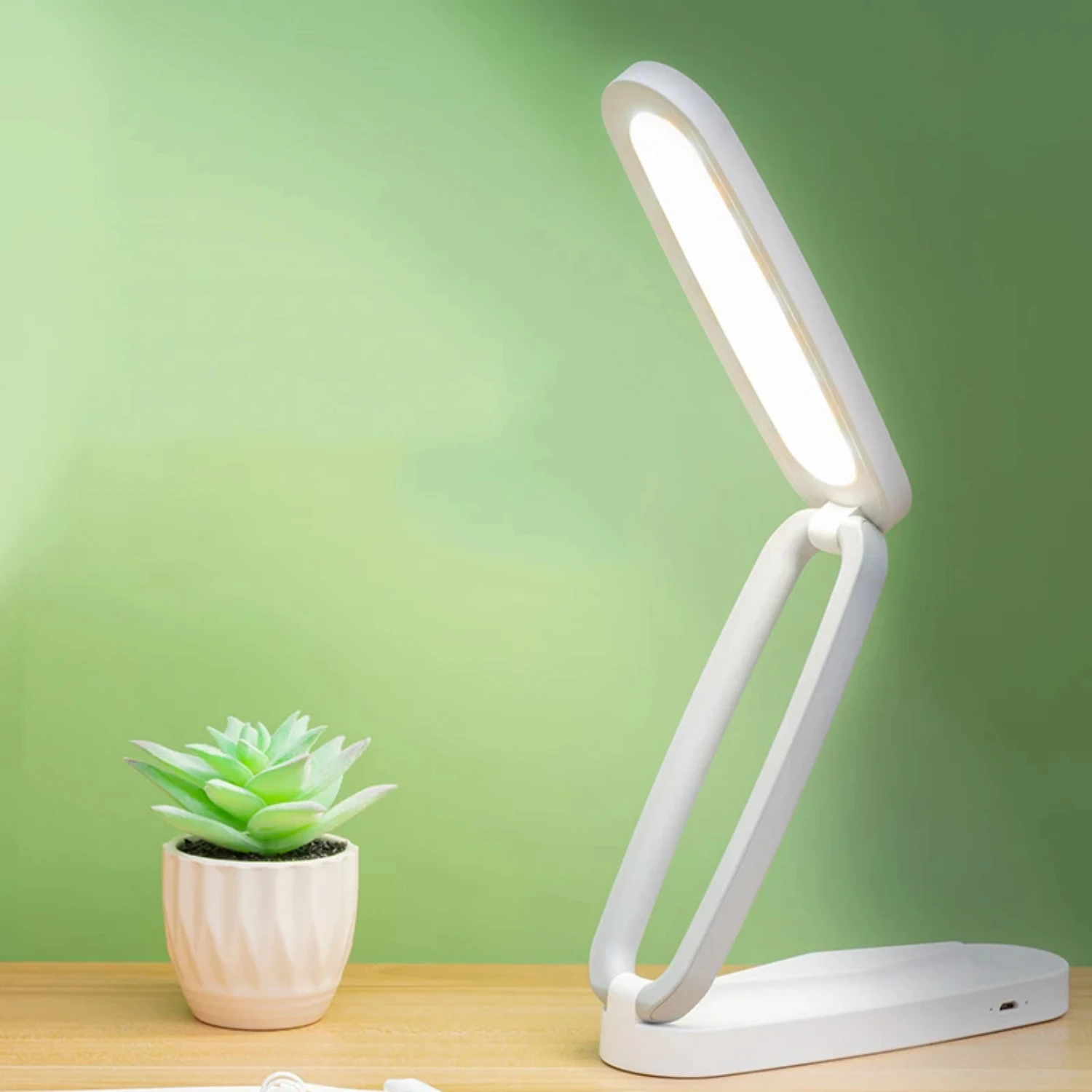 Stylish, portable and dimmable rechargeable LED desk lamp for reading and office table with eye protection. This new arrival boa