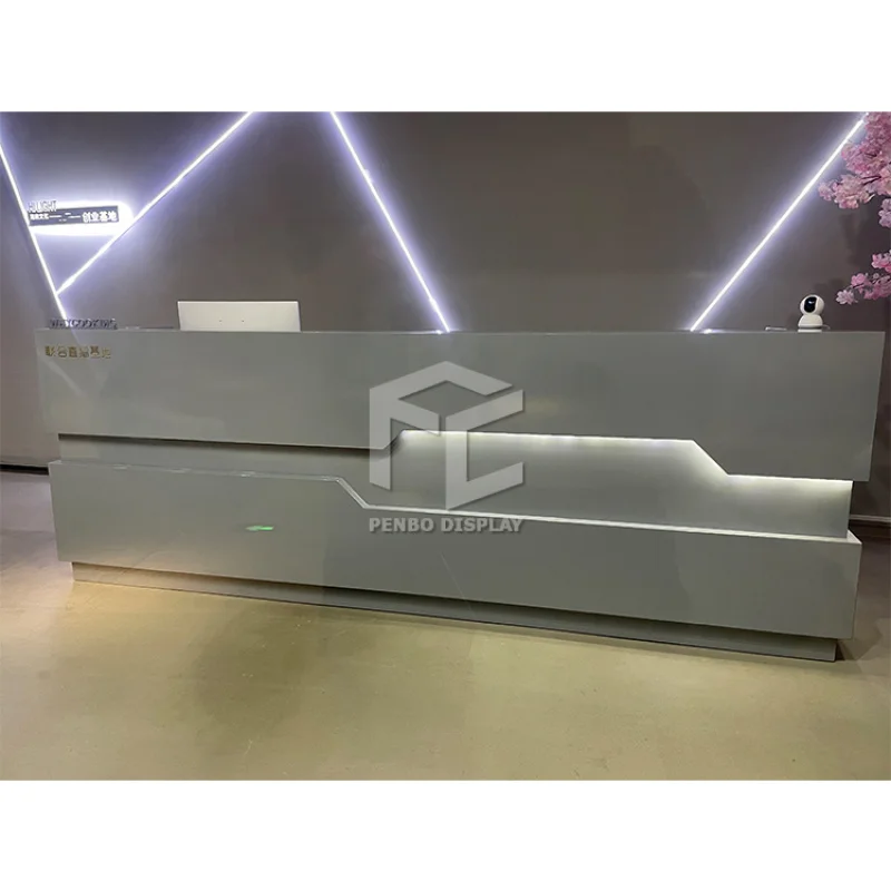 

2025customized.Penbo Solid Surface Straight Office Furniture Beauty Salon Reception Desk Service Counter