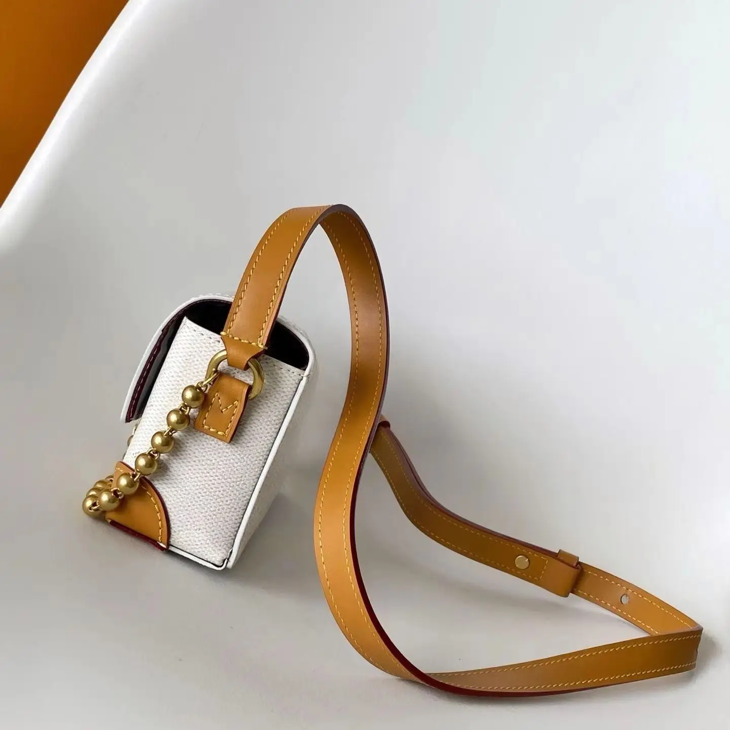 Small calf leather mini messenger bag, vintage brass hardware, slim flat silhouette, minimalist style shoulder bag.