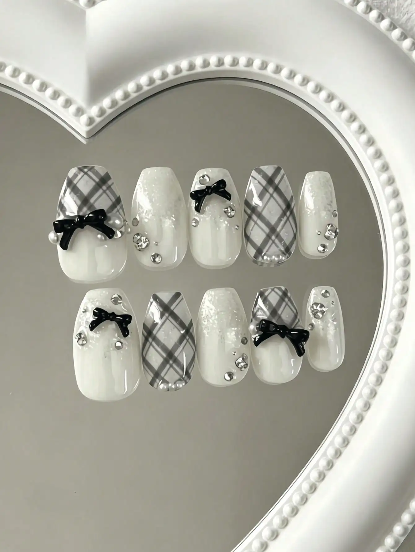 10 Pieces of Medium-Length Press-On Nails, Mixed Shades of Off-White, Gray, and Black, with Hand-Painted Plaid Patterns, Paired with 3D Black Bowknots and Rhinestone Decorations, in a Japanese Elegant and Simple Style, Perfect for Girls, Suitable for Dates, Parties, Daily Wear, and Light Vintage Occasions, Comes with a Jelly Glue and a Nail File