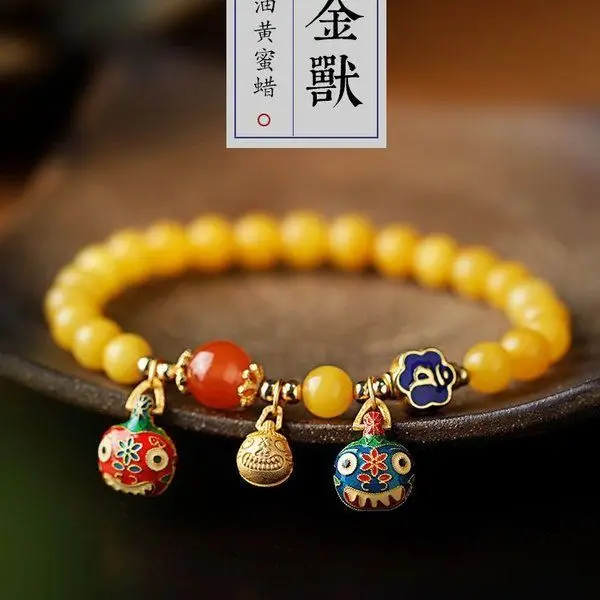 

Natural Honey Yellow Chicken Grease Beeswax Bracelet Female Southern Red Agate Swallowing Gold Beast Accessories Birth Buddha