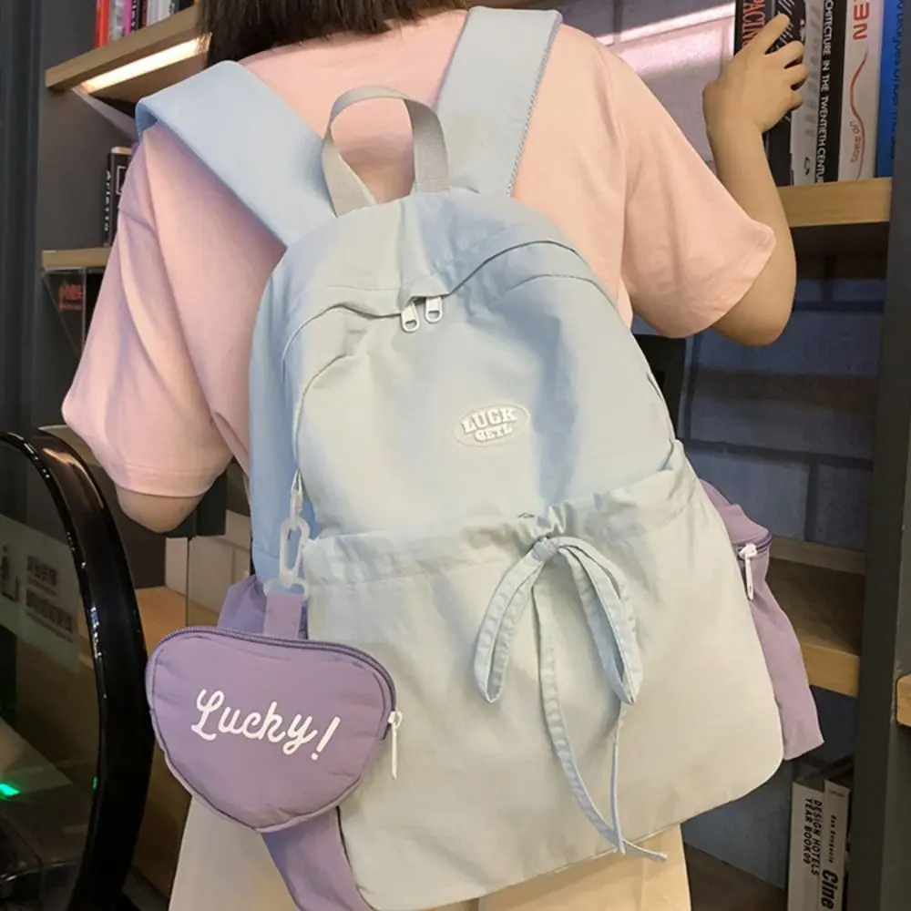 حقيبة ظهر مدرسية من النايلون خفيفة الوزن ومريحة وجذابة للسفر حقيبة مدرسية عصرية مقاومة للماء للاستخدام اليومي
