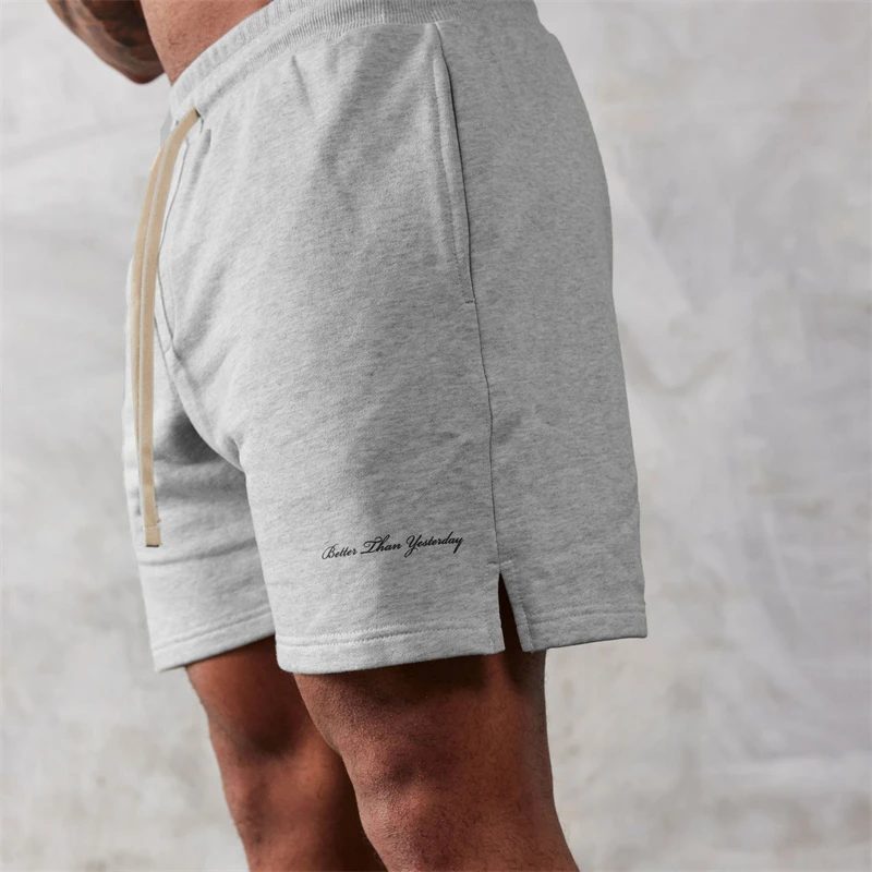 Pantaloncini da uomo grigi in cotone nuovo estivo alla moda di marca alla moda pantaloncini da cinque centesimi da uomo jogger fitness pantaloni