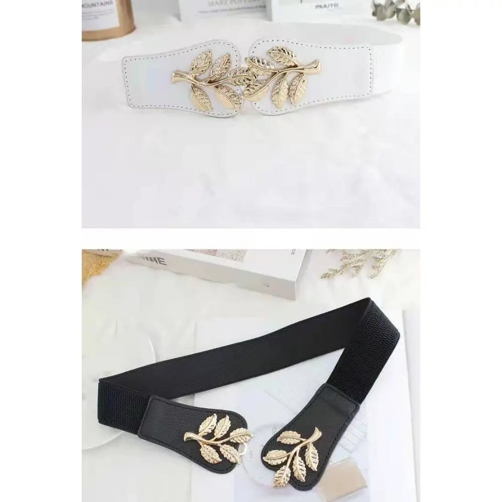 الخصر النسائي الرائع ذو الأوراق الذهبية المتطابقة مع تصميم فاخر بإبزيم خطاف وأزرار حزام عريض يقترن مع التنورة