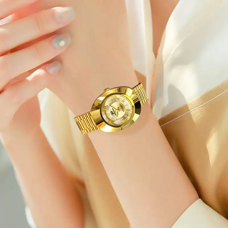 JONNY MOORE 8561 ساعة كوارتز ذهبية عصرية للنساء مع تصميم تاريخ تلقائي ساعات رائعة بحزام فولاذي للنساء Reloj Mujer