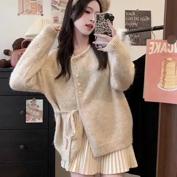 

Two-Piece Apricot Irregular Bandage Long-Sleeved Knitted Sweater Pleated Skirt 2024 Autumn Winter New Design Sense Suit