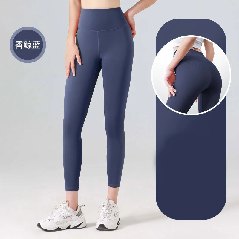 Pantaloni da yoga attillati per il fitness da corsa da donna nudi elastici a vita alta color pesca per abbigliamento outdoor