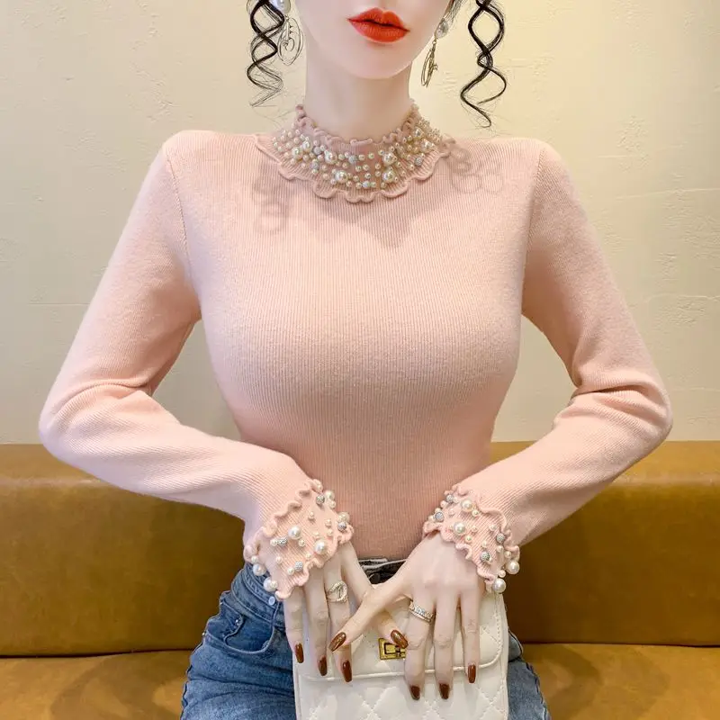 الكورية نمط شتاء جديد شبه عالية الياقة الدانتيل الصناعة الثقيلة مسمار حبة سميكة محبوك سترة المرأة أنيقة التخسيس