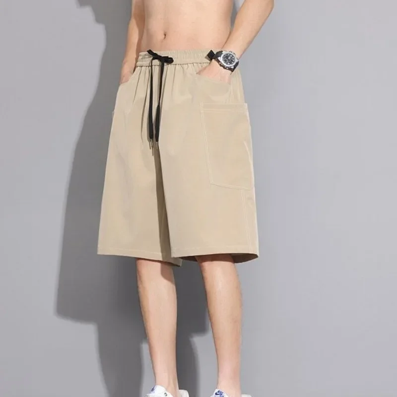 مع سلسلة رسم جيوب صلبة برمودا شورت رجالي البضائع كبير الحجم نصف فضفاض واسع فضفاض كبير الحجم مرونة الخصر طويل شعبي طويل القامة