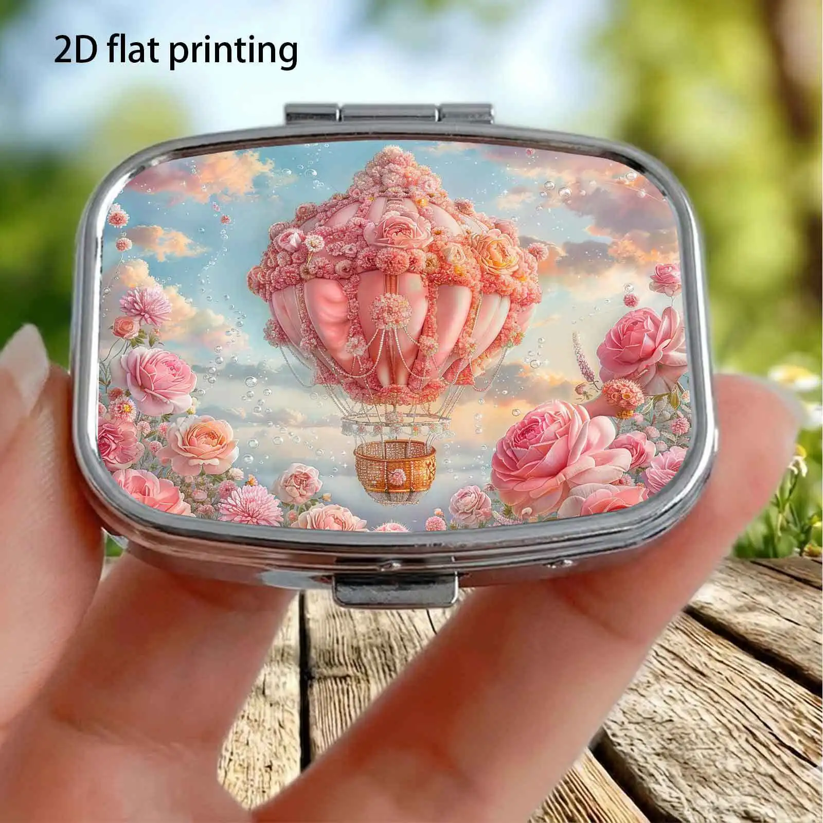 Single pack, flat, with a uniquely designed box featuring a pink rose cloud and hot air balloon wave pattern, square compartment design, can also be used as a vitamin storage box, dreamy and beautiful, suitable for travel and daily use