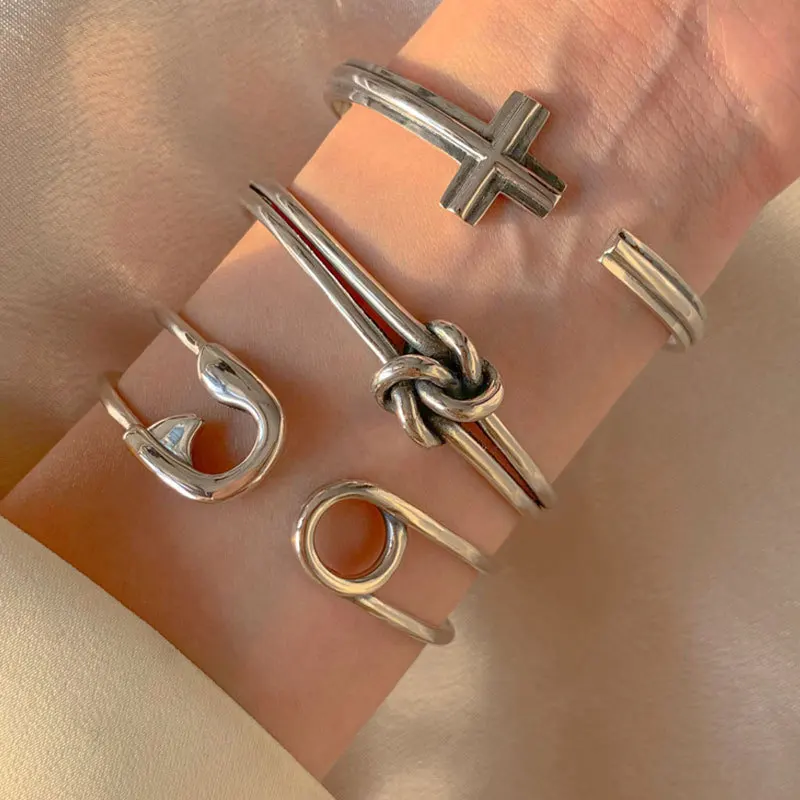 

Cross pin knotted heavy industry sterling silver bracelet light luxury bouncing fashion niche retro cold wind silver bracelet
