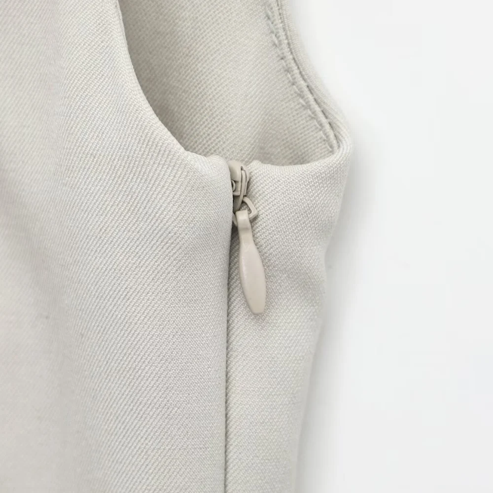 ชุดจั๊มสูทแฟชั่นใหม่สำหรับผู้หญิง คอเหลี่ยม สายเดี่ยว ไม่มีแขน มีกระเป๋าซิป เหมาะสำหรับฤดูใบไม้ผลิ/ฤดูร้อน