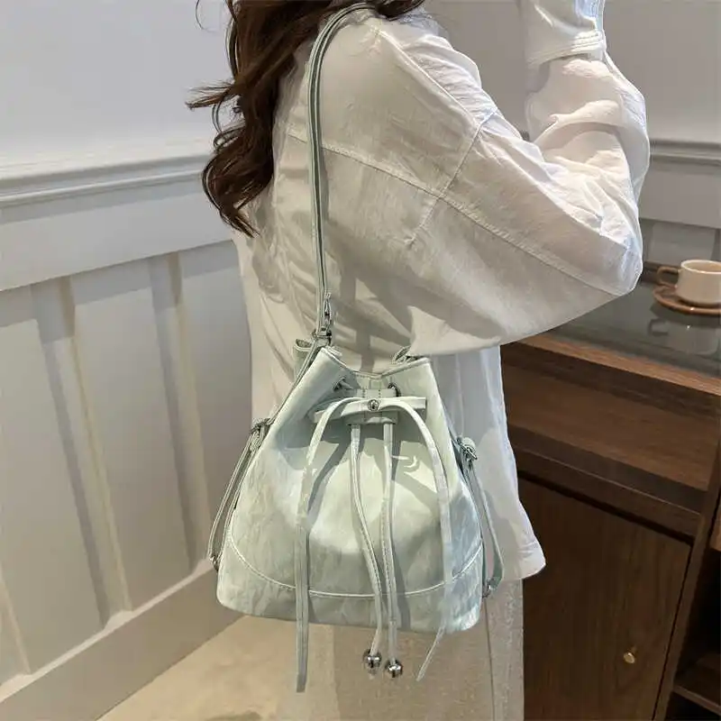 トレンディな女性のバケットバッグクロスボディバッグ巾着デザイン多用途高品質小型ファッショナブルなカジュアルユニセックスバックパック