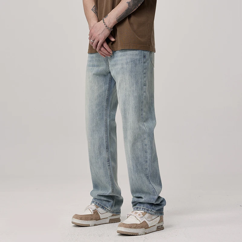 Retro washed denim jeans for men in spring and summer loose straight leg pants American high street casual elastic long pants