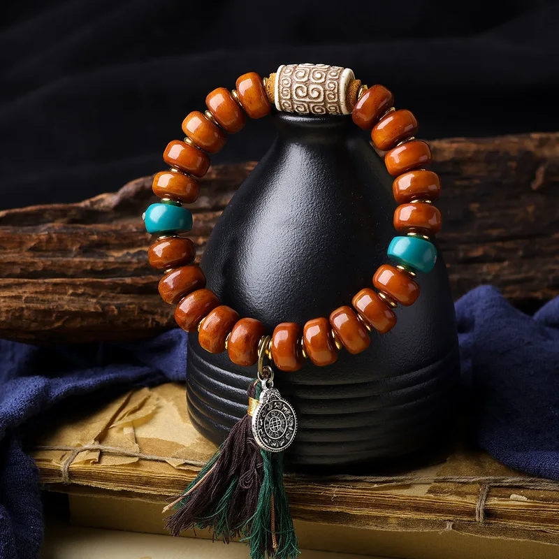 Original Tibetan-style bone and pill bead intricate patterns, a traditional charm bracelet with a nine-square desi