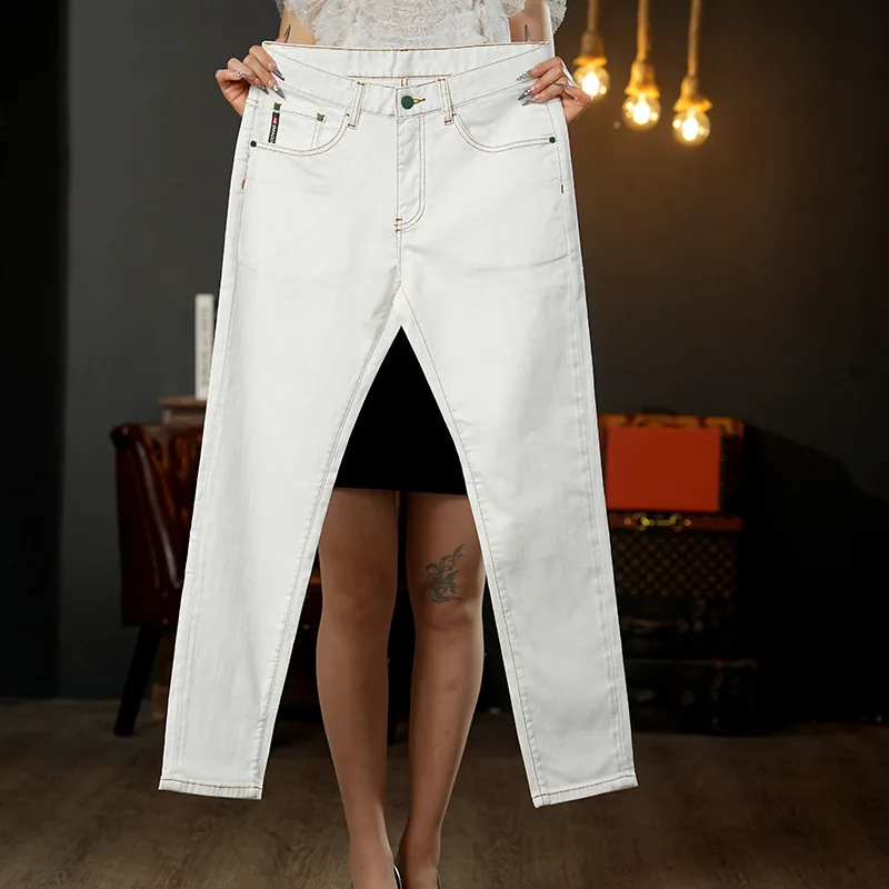 

2025 summer new white jeans men's light luxury high-end business men's casual versatile elastic slim fit small leg pants