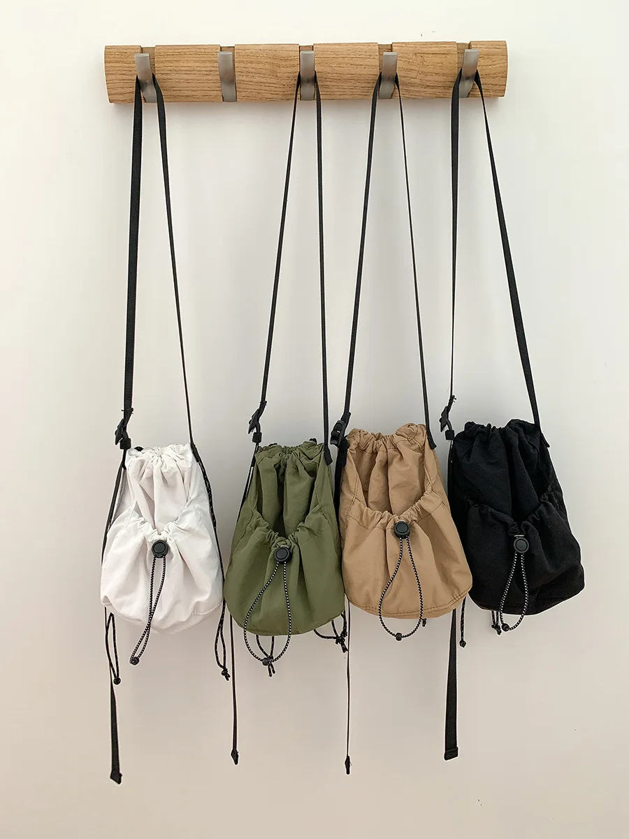 New nylon crossbody bucket bag for women casual trend shoulder bag design pull rope fold bag for women