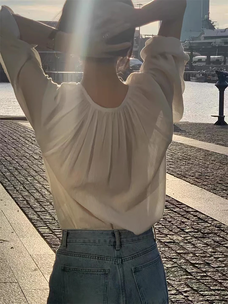 Chic Spring Gentle Wind round Ne ell Button Design Texture Loose Casual Long Sve Women's irt Korean Sle Bubble Sve