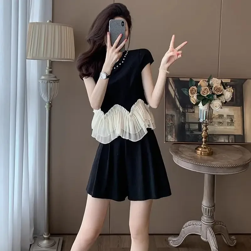 

Элегантные вечерние женские короткие комплекты из 2 предметов с круглым вырезом и жемчугом Футболка в корейском стиле Женские шорты Новые в сочетании координатных тенденций