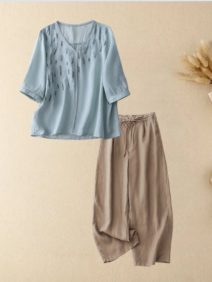 

Комплект из двух предметов: хлопково-льняная рубашка с V-образным вырезом и широкие брюки. Женский свободный тонкий костюм с рукавом до локтя для весны и лета.