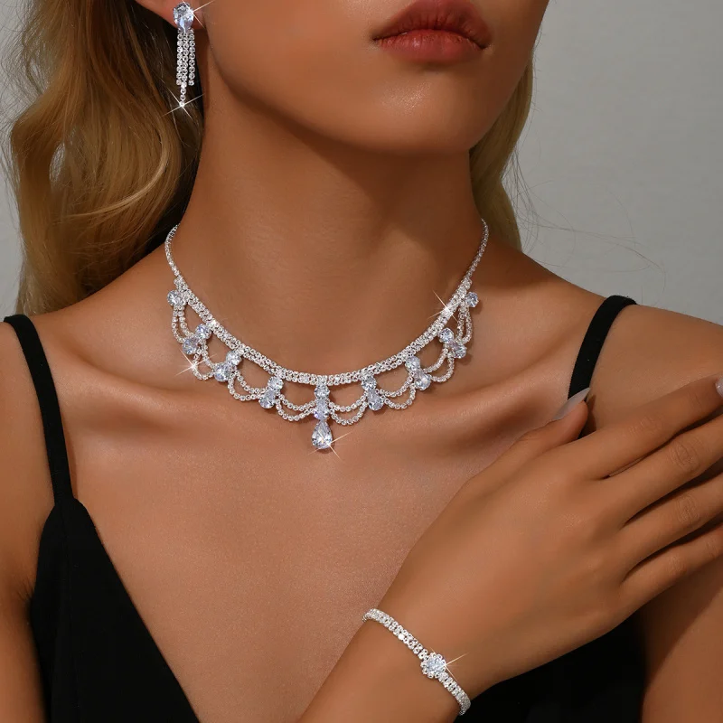 

AliExpress New Water Drop Necklace Earring Set for Women High-End Multi-Layer Hollow Rhinestone Collarbone Chain Fashion Accesso