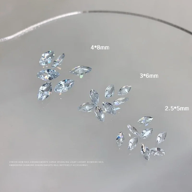 40Pcs Clear Marquise Zircon Nail Rhinestones, Sparkling White Mixed Sizes Pointed Back Gems for Trendy Butterfly Nail Clusters
