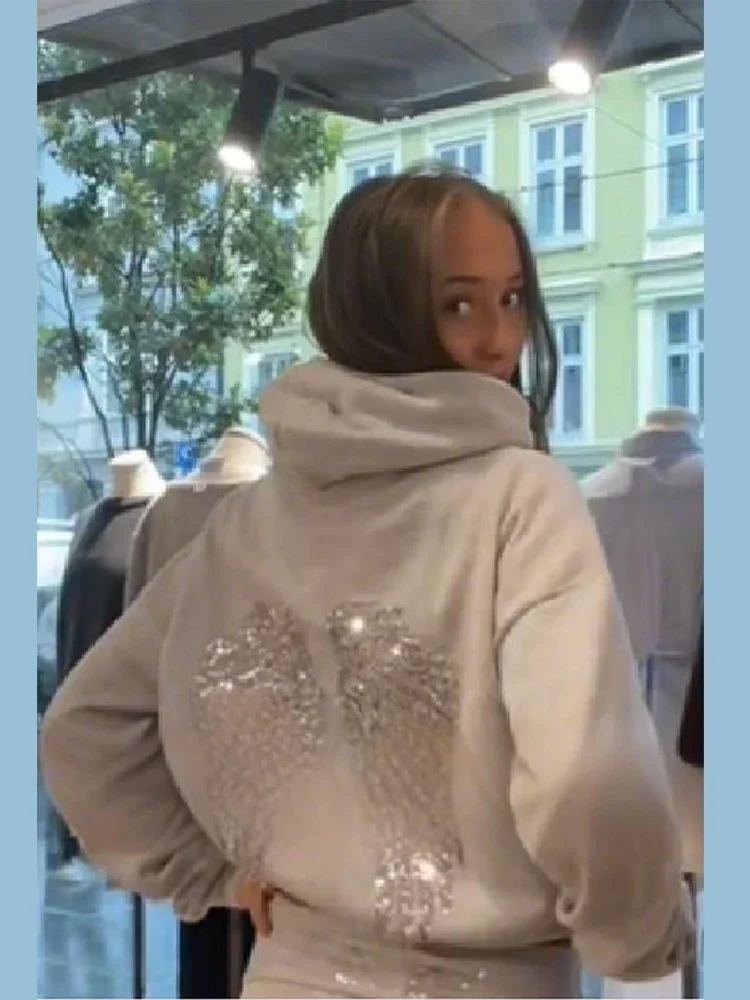 سترة نسائية موضة 2025 بغطاء للرأس مرقعة على شكل جناح أبيض وأكمام طويلة وجيب علوي للخريف والشتاء ملابس عالية الشارع #3