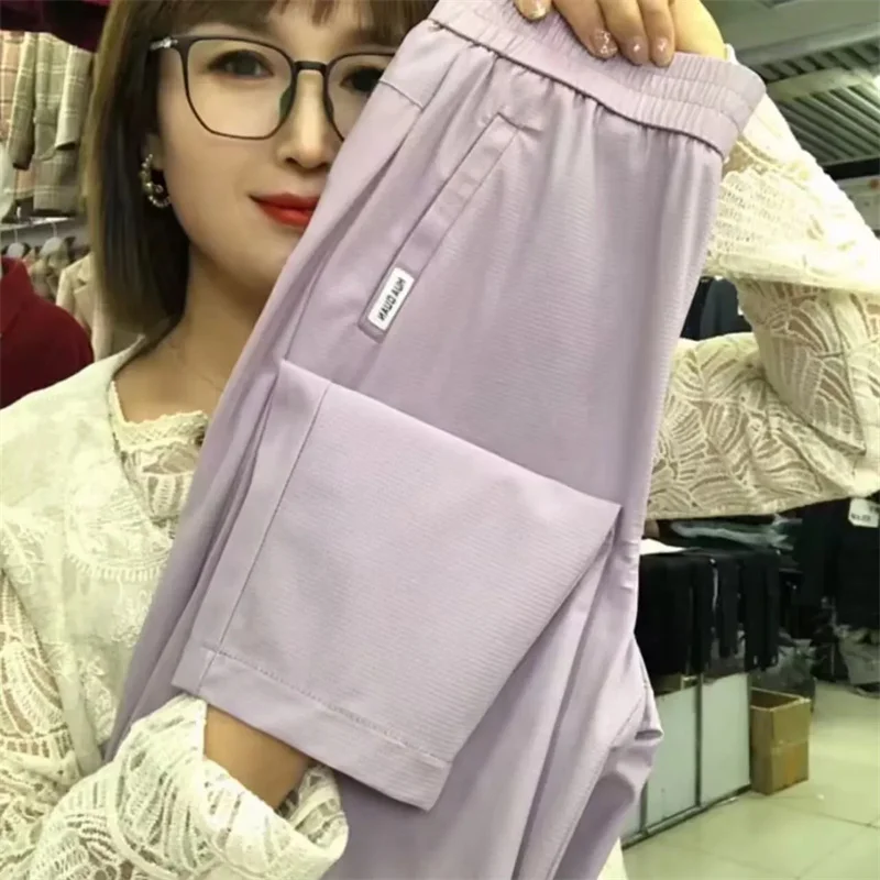جديد 2025 السراويل النسائية الكورية الصيف واقية من الشمس رقيقة عالية الخصر عادية فضفاض تنفس السراويل الرياضية الإناث هارون السراويل السيدات
