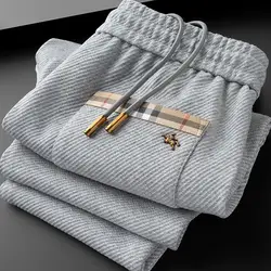 2024 autumn and winter new light luxury fashion solid color metal logo versatile casual straight elastic waist guard pants men