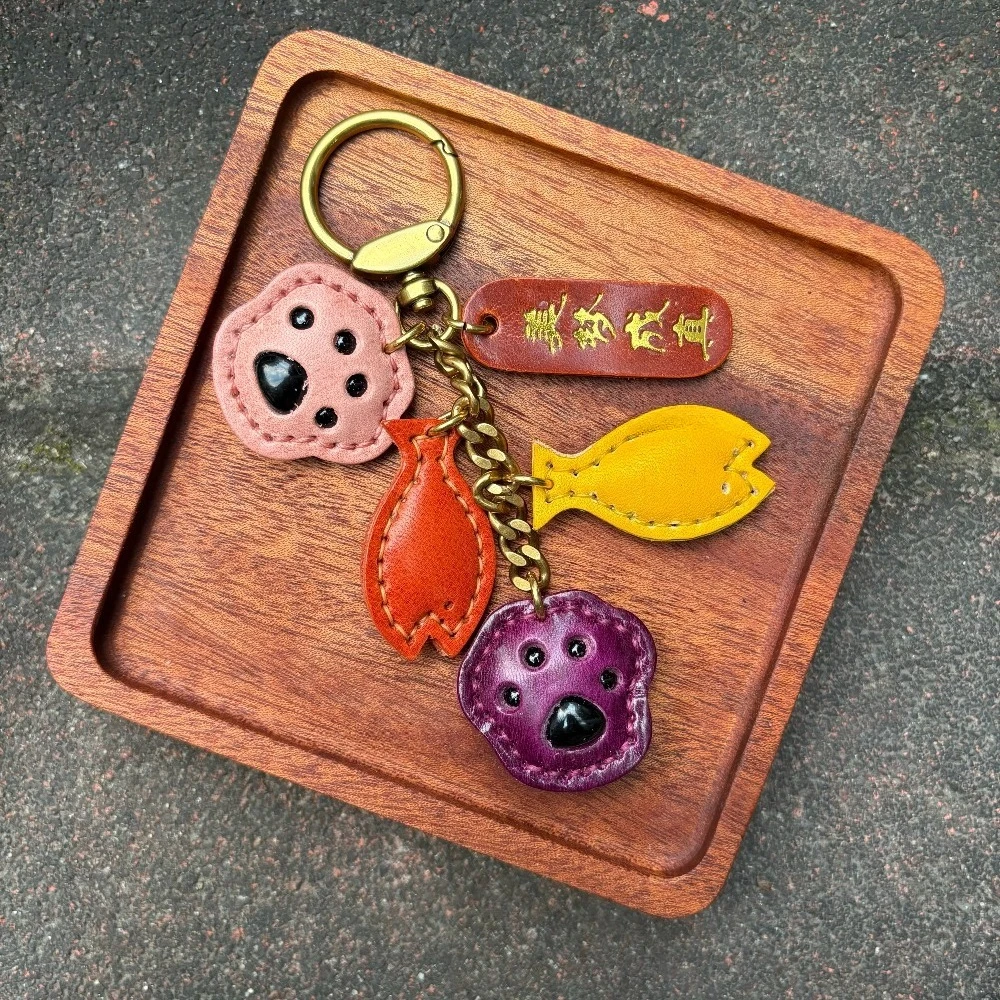 

Handmade genuine leather cowhide 'dream come true' pendant, small paw charm fish and bear paw style lucky ornament car keychain